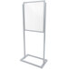 A silver rectangular sign holder with a white background.