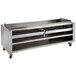 A stainless steel Wolf wood assist stand with two wood trays.