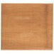 An American Metalcraft carbonized bamboo serving board with a wood surface.