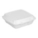 A Dart white foam take out container with a perforated lid.