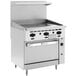 A stainless steel Wolf Challenger XL series natural gas range with griddle and oven.