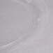 A close up of a WNA Comet clear plastic plate with a decorative design.