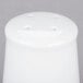A white porcelain salt shaker with holes.