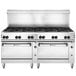 A Wolf stainless steel commercial gas range with 12 burners and 2 standard ovens.