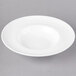 A white bowl with a rim.