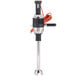 A black and silver KitchenAid immersion blender with a whisk attachment.