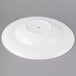A white porcelain pasta bowl with a circular edge.