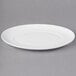 A white 10 Strawberry Street Ricard porcelain salad plate with a rim.