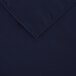 A navy blue rectangular table cover with a folded edge.