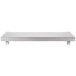 A Wolf stainless steel metal high shelf with legs.