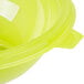 A close up of a green Fineline PET plastic salad bowl.