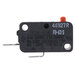 A close-up of a black and orange Solwave interlock microswitch.