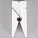 An American Metalcraft white clothespin card holder with a metal hook.