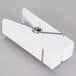 An American Metalcraft white clothespin with a metal clip.