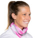 A woman wearing a pink camo Headsweats headband.