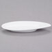 An Arcoroc white porcelain oval dish.