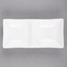 A white rectangular Arcoroc porcelain dish with two compartments.