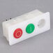 A white plastic Robot Coupe On/Off switch assembly with red and green buttons.