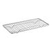 A rectangular, metal, footed pan grate designed for use with a 1/3 size steam table pan.
