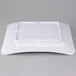 A white square GET Milano melamine plate.