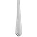 A close up of a 10 Strawberry Street Lincoln stainless steel dinner knife with a white background.