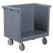 A Cambro granite gray plastic tray and dish cart with wheels.