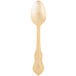 A 10 Strawberry Street Crown Royal stainless steel teaspoon with a gold-plated handle on a white background.