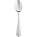 A silver spoon with a black handle on a white background.