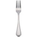 A silver fork with a white handle.