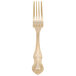 A 10 Strawberry Street Crown Royal stainless steel dinner fork with a gold-plated handle with a design.