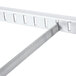 A metal divider bar with holes for a Star Grill Max Pro.