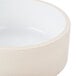 A white Chef & Sommelier stackable bowl with a white rim.