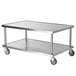 A Vollrath stainless steel equipment stand with casters.