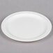 a white plate with a fork
