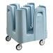 A light blue Metro PCD7 'Poker Chip' dish dolly on wheels designed to hold up to 540 dishes.