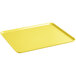 A yellow rectangular Cambro market tray with a handle.