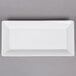 An American Metalcraft white rectangular stoneware platter on a gray background.