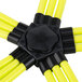 A yellow and black Flat Tech table pad connector with black cables connected to a black square.
