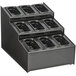 A black rectangular Vollrath condiment organizer with nine empty compartments.