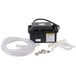 A black Hoshizaki condensate drain pump box with a hose and tube inside.