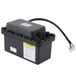 A small black electrical box with a power cord.