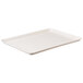 A white rectangular MFG Tray bakery display tray with a white border.