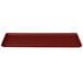 A burgundy rectangular MFG Tray display tray with white edges.