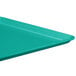 A mint green MFG fiberglass display tray.