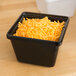 a tray of shredded cheese