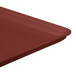 A close up of a large rectangular burgundy MFG Tray display tray.