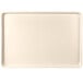 A beige rectangular MFG Tray with a white border.