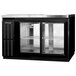 A black Continental Back Bar refrigerator with sliding glass doors.