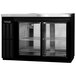 A black Continental back bar refrigerator with glass doors.