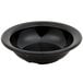 A Carlisle black melamine fruit bowl on a table.